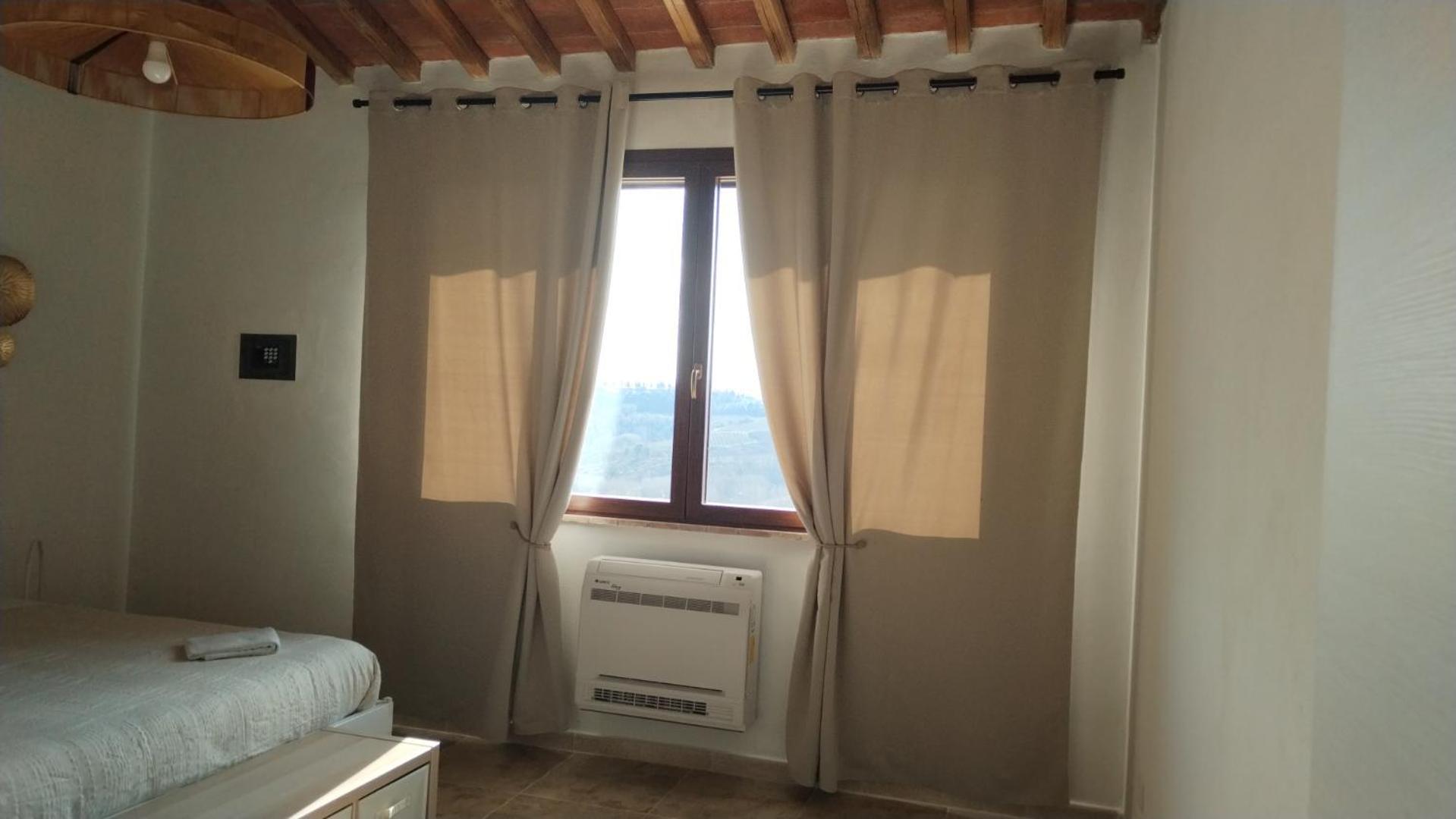 Agriturismo Poggio Rotondo ซานจีมิญญาโน ภายนอก รูปภาพ